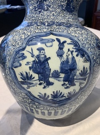 An impressive Chinese blue and white 'Eight Immortals' double gourd vase, Jiajing/Wanli