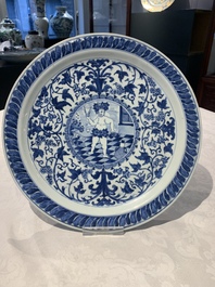 A rare and large Chinese blue and white 'Bacchus' dish, Kangxi