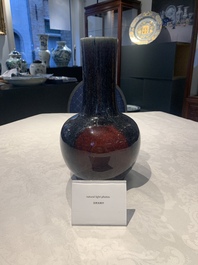 A Chinese flamb&eacute;-glazed bottle vase, 19th C.