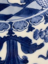 A rare and large Chinese blue and white 'Bacchus' dish, Kangxi
