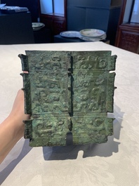 A Chinese archaic bronze ritual wine vessel, 'yi 彝', Shang