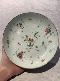 A Chinese famille rose bowl, a plate and a blue and white vase, Tongzhi mark and of the period