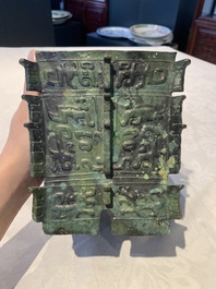 A Chinese archaic bronze ritual wine vessel, 'yi 彝', Shang