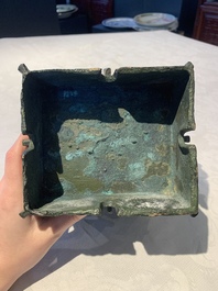 A Chinese archaic bronze ritual wine vessel, 'yi 彝', Shang