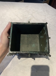 A Chinese archaic bronze ritual wine vessel, 'yi 彝', Shang