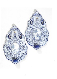 A pair of blue and white Dutch Delft wall sconces, 18th C.