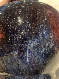 A Chinese flamb&eacute;-glazed bottle vase, 19th C.
