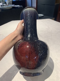 A Chinese flamb&eacute;-glazed bottle vase, 19th C.