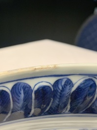 A rare and large Chinese blue and white 'Bacchus' dish, Kangxi