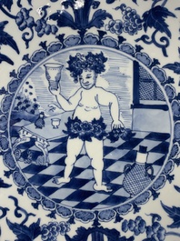A rare and large Chinese blue and white 'Bacchus' dish, Kangxi