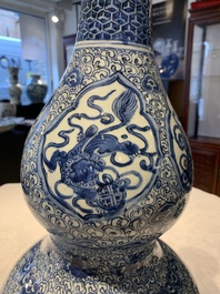 An impressive Chinese blue and white 'Eight Immortals' double gourd vase, Jiajing/Wanli