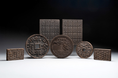 Seven Chinese Pu'er tea and black tea bricks, 20th C.