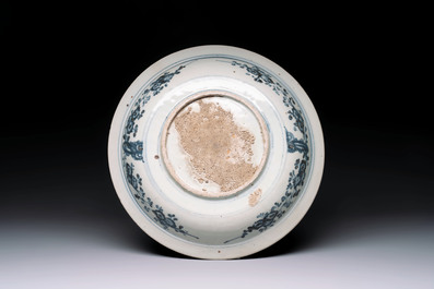 A Chinese Swatow blue and white 'lady and a boy' dish, Ming