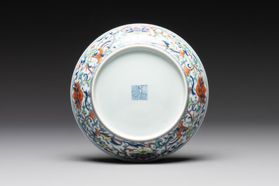A Chinese doucai 'phoenix and lotus scroll' plate, Qianlong mark and of the period