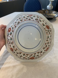 A Japanese-lacquered Chinese blue and white dish and a Japanese Kutani 'phoenix' dish, Wanli/19th C.