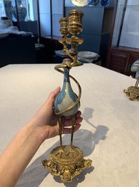 A pair of Chinese cloisonn&eacute; cranes, later mounted as candelabras, 18th C.