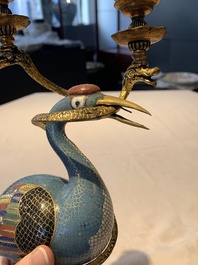 A pair of Chinese cloisonn&eacute; cranes, later mounted as candelabras, 18th C.
