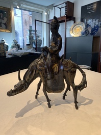 A large Chinese partly gilt bronze censer and cover in the form of Du Fu, 18th C.