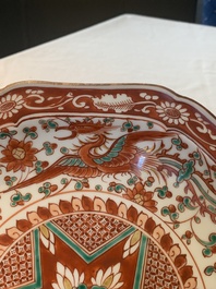 A Japanese-lacquered Chinese blue and white dish and a Japanese Kutani 'phoenix' dish, Wanli/19th C.