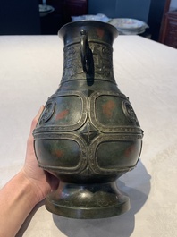 A Chinese archaistic gold- and silver-inlaid bronze vase with pseudo-rust patina, 19th C.