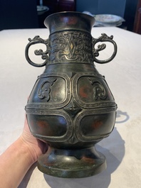 A Chinese archaistic gold- and silver-inlaid bronze vase with pseudo-rust patina, 19th C.