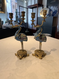 A pair of Chinese cloisonn&eacute; cranes, later mounted as candelabras, 18th C.