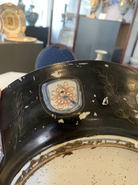 A Japanese-lacquered Chinese blue and white dish and a Japanese Kutani 'phoenix' dish, Wanli/19th C.