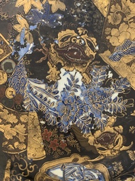 A Japanese-lacquered Chinese blue and white dish and a Japanese Kutani 'phoenix' dish, Wanli/19th C.