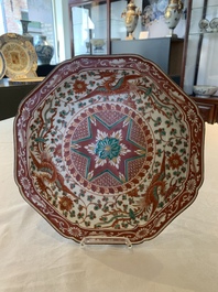 A Japanese-lacquered Chinese blue and white dish and a Japanese Kutani 'phoenix' dish, Wanli/19th C.