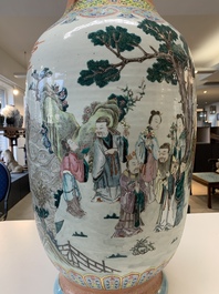 A large Chinese famille rose coral-red-ground  'Eight Immortals' vase, Qianlong mark, 19th C.