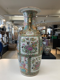A pair of Chinese Canton famille rose vases with narrative design, 19th C.
