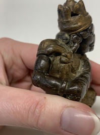 A small Chinese gilt bronze paperweight in the form of a kneeling foreigner, Ming