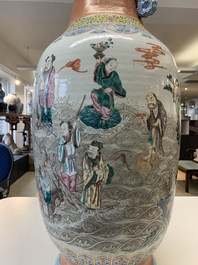 A large Chinese famille rose coral-red-ground  'Eight Immortals' vase, Qianlong mark, 19th C.