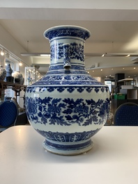 A large Chinese blue and white 'lotus and peony scroll' 'hu' vase, 19th C.