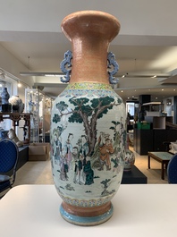 A large Chinese famille rose coral-red-ground  'Eight Immortals' vase, Qianlong mark, 19th C.