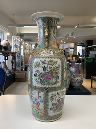 A pair of Chinese Canton famille rose vases with narrative design, 19th C.