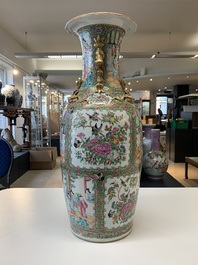 A pair of Chinese Canton famille rose vases with narrative design, 19th C.
