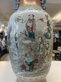 A large Chinese famille rose coral-red-ground  'Eight Immortals' vase, Qianlong mark, 19th C.