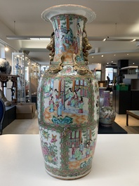 A pair of Chinese Canton famille rose vases with narrative design, 19th C.