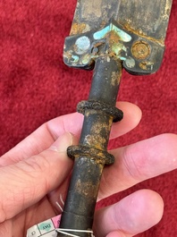 A rare Chinese turquoise-inlaid parcel-gilt bronze sword, Zhou