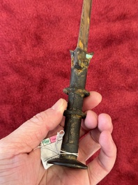 A rare Chinese turquoise-inlaid parcel-gilt bronze sword, Zhou
