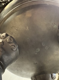 A massive Vietnamese copper- and silver-inlaid 'Buddhist lion' censer and cover on stand, 19th C.