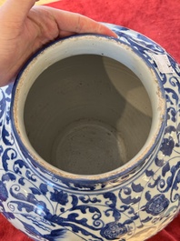 A large Chinese blue and white baluster vase with figures and landscapes, Transitional period