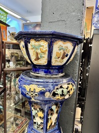 A Chinese or Vietnamese polychrome-glaze pottery jardini&egrave;re and stand, 19th C.