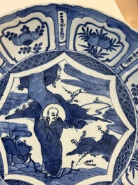 A Chinese blue and white 'kraak' dish with Damo in a landscape, Wanli