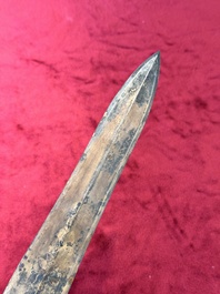 A rare Chinese turquoise-inlaid parcel-gilt bronze sword, Zhou