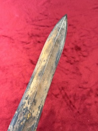 A rare Chinese turquoise-inlaid parcel-gilt bronze sword, Zhou