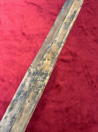 A rare Chinese turquoise-inlaid parcel-gilt bronze sword, Zhou