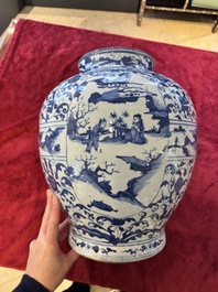A large Chinese blue and white baluster vase with figures and landscapes, Transitional period