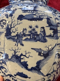 A large Chinese blue and white baluster vase with figures and landscapes, Transitional period
